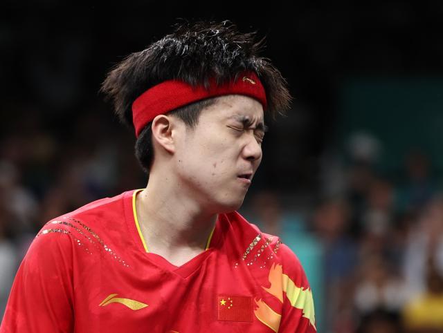 1722479268715058711.jpg 巴黎奥运会丨乒乓球——男单:王楚钦无缘16强XxjpseC009610_20240731_MVPFN0A001.jpg